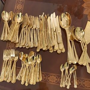 Golden color flatware by wMRogers & son made in China with flower design